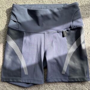 Athleta Slate Blue High-Rise Bike Shorts with White Reflective Stripes
